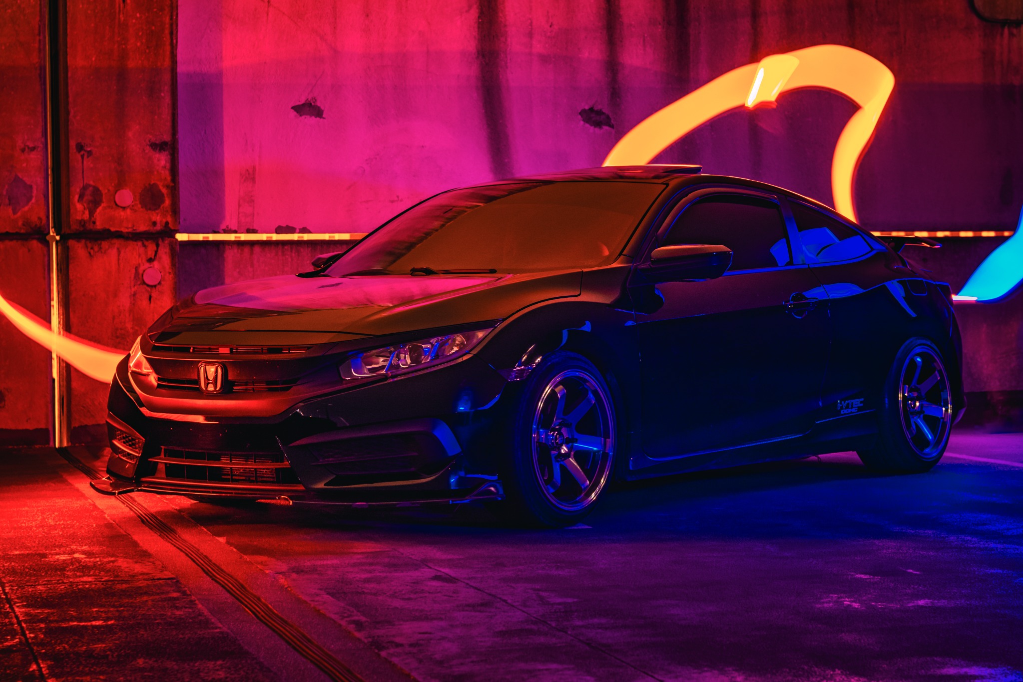 Honda Civic photographed with neon lighting