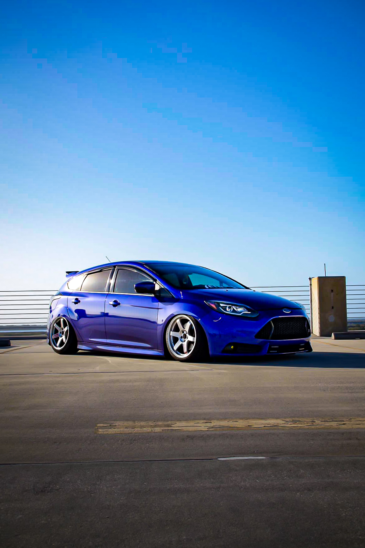 Blue Ford Focus ST on a rooftop